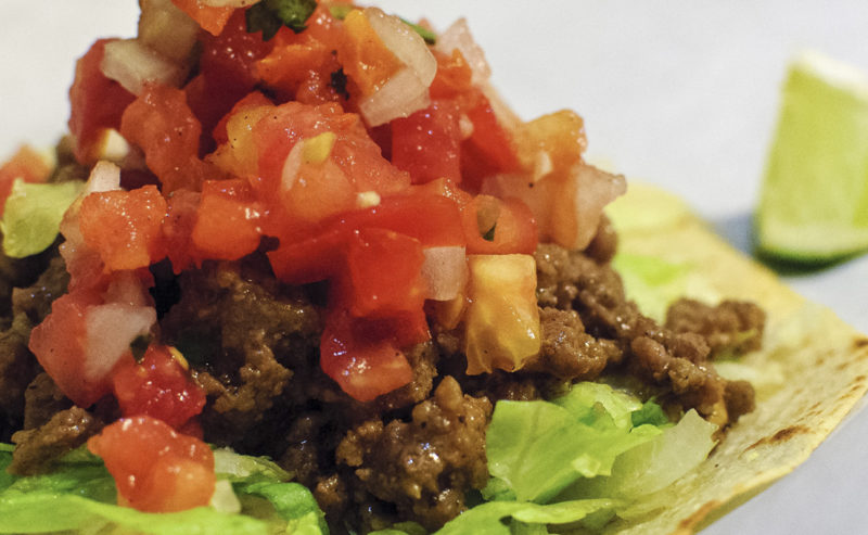 RASPADA CORN TOSTADA WITH PICADILLO